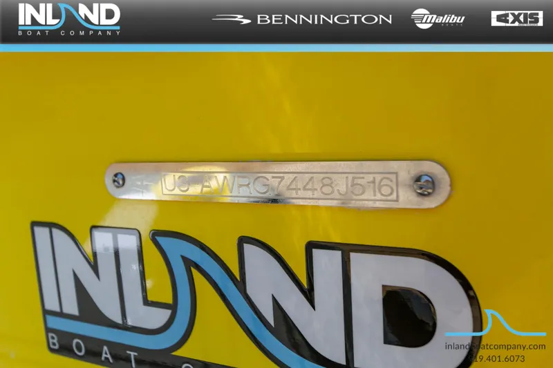 Slide: The Image of 2016 Axis T23 boat with Inland Boat Company logo and serial number plate. - 21