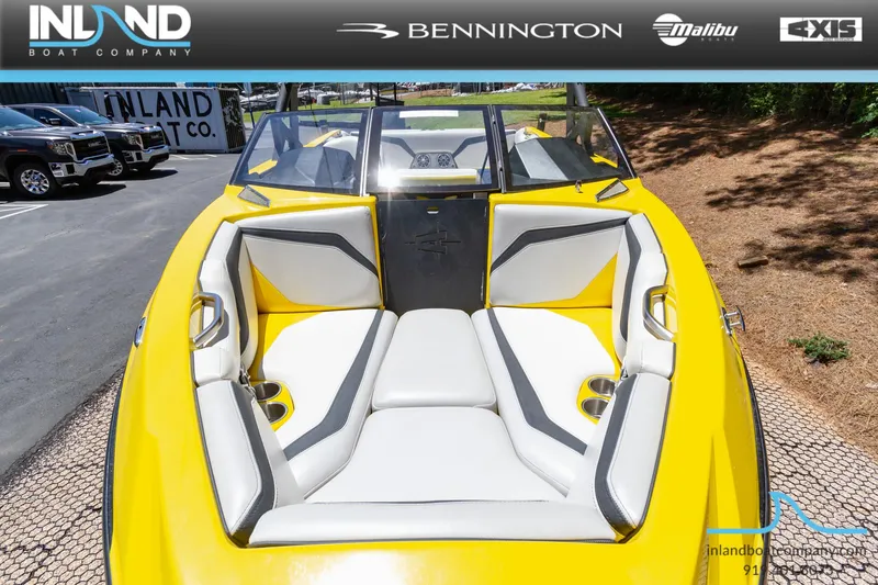 Slide: The Image of 2016 Axis T23 boat with yellow and white interior at Inland Boat Company. - 3