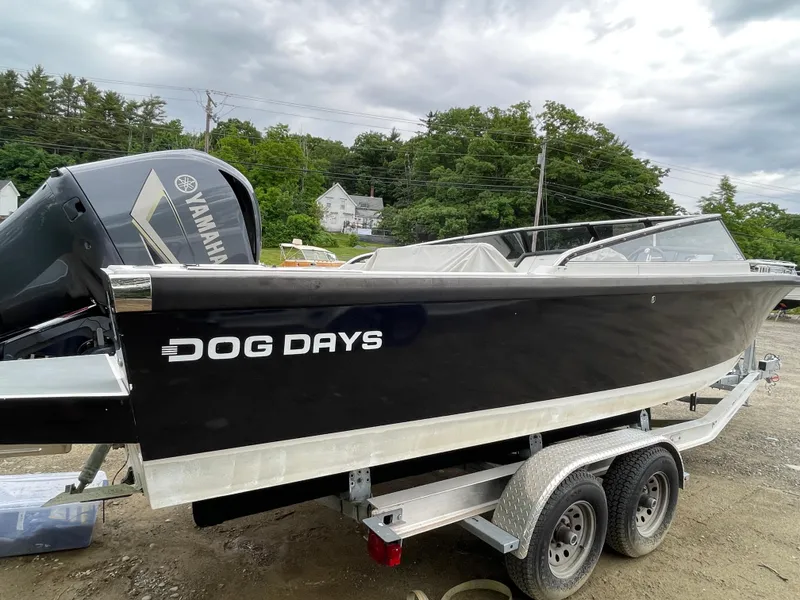 Slide: The Image of 2016 Draco 27 RS boat named Dog Days on a trailer with Yamaha outboard motor. - 1
