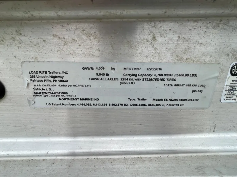 Slide: The Image of 2016 Draco 27 RS trailer label with specifications and manufacturing details. - 35