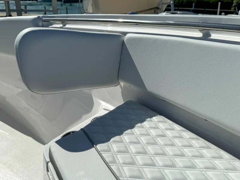 Slide: The Image of 2025 Sea Fox 328 Commander boat interior with quilted seating and sleek design. - 22