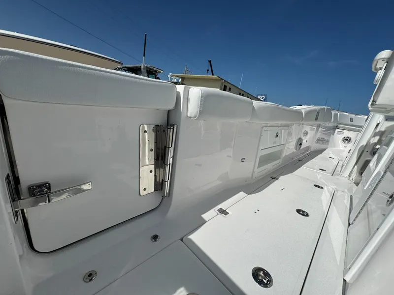 Slide: The Image of 2025 Sea Fox 328 Commander boat interior with sleek white design and modern features. - 27
