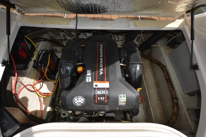 Slide: The Image of 2012 Four Winns F244 engine compartment with Volvo Penta 300 V8 engine. - 17