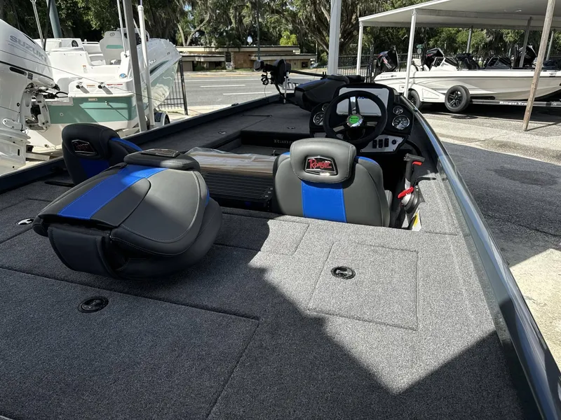 Slide: The Image of 2024 Ranger 178 boat interior with seating and control console. - 2