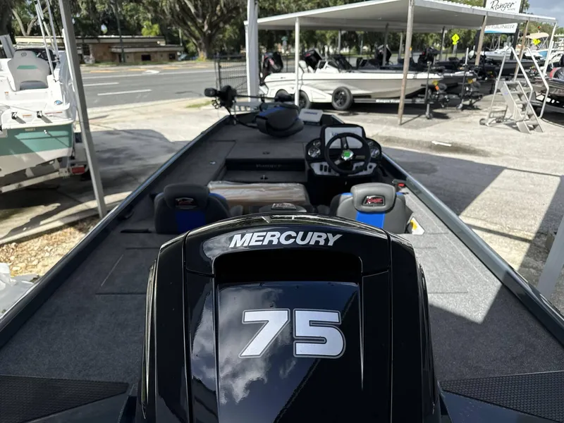 Slide: The Image of 2024 Ranger 178 boat with Mercury 75 engine at a dealership. - 3