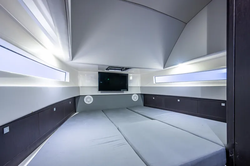 Slide: The Image of Luxurious interior cabin of 2021 Gulf Crosser 52 yacht with modern design and TV. - 48