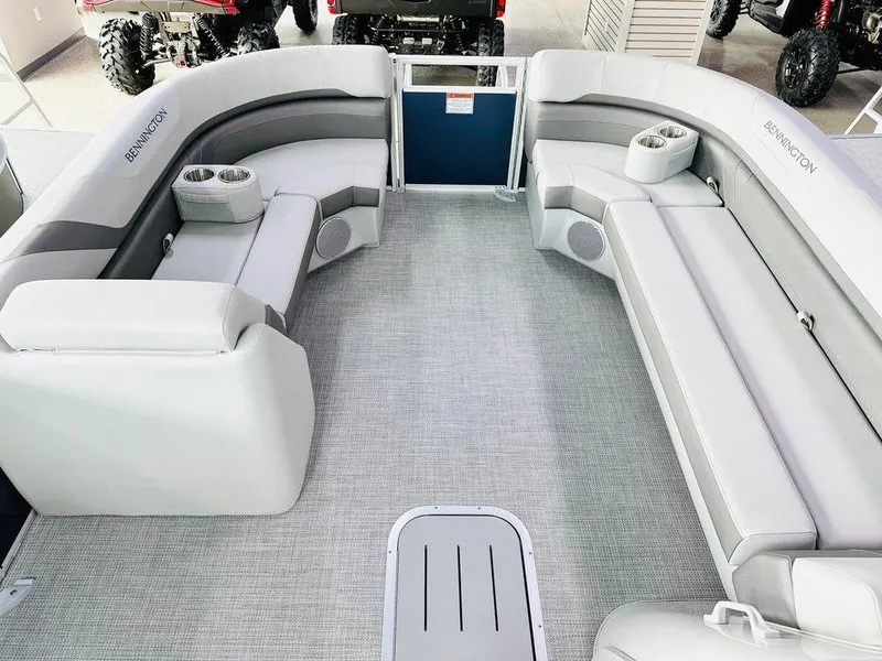 Slide: The Image of 2025 Bennington 24 SXSB pontoon boat interior with spacious seating and cup holders. - 3