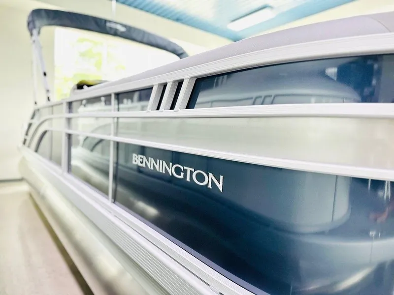 Slide: The Image of 2025 Bennington 24 SXSB pontoon boat in showroom. - 4