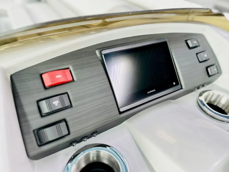 Slide: The Image of Dashboard of 2025 Bennington 24 SXSB boat with touchscreen and control buttons. - 7