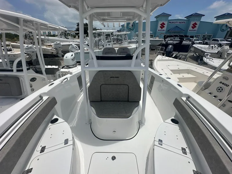 Slide: The Image of 2024 Sea Pro 222 Center Console boat at Palm City Yachts dealership. - 6