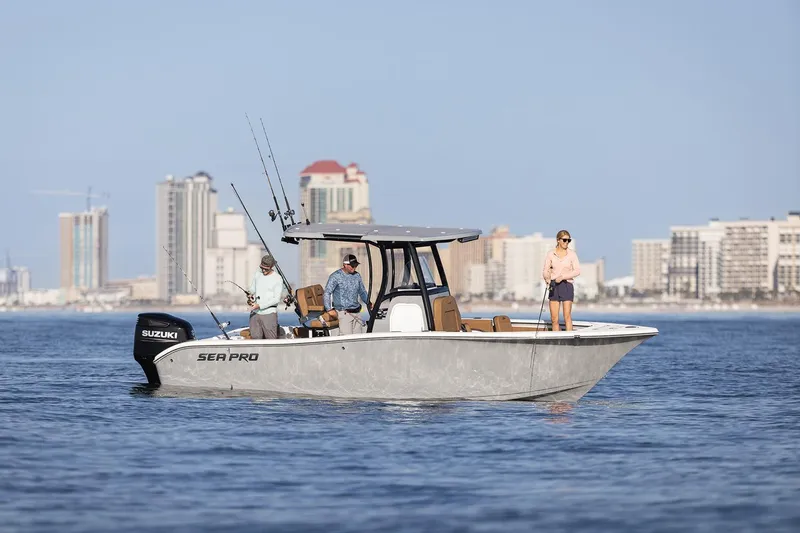 Slide: The Image of 2024 Sea Pro 242 Center Console boat with people fishing near city skyline. - 10