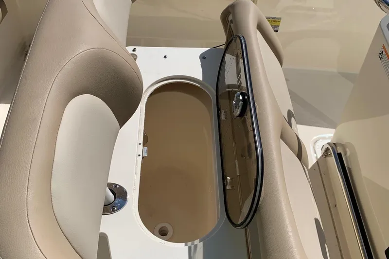 Slide: The Image of 2024 Scout 195 Sportfish boat seating and storage compartment. - 8