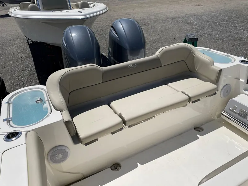 Slide: The Image of 2022 Key West 263 FS boat with dual engines and comfortable seating. - 11