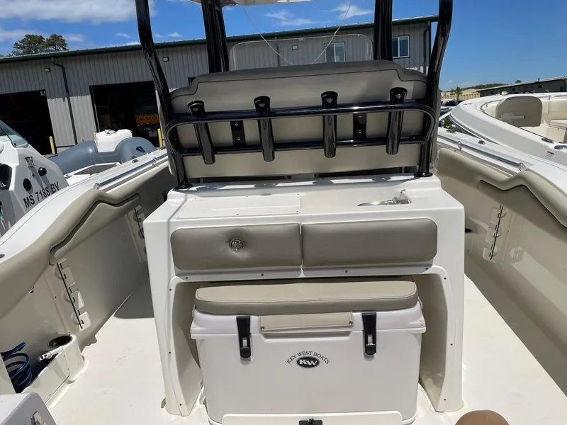 Slide: The Image of 2022 Key West 263 FS boat interior with seating and storage. - 12