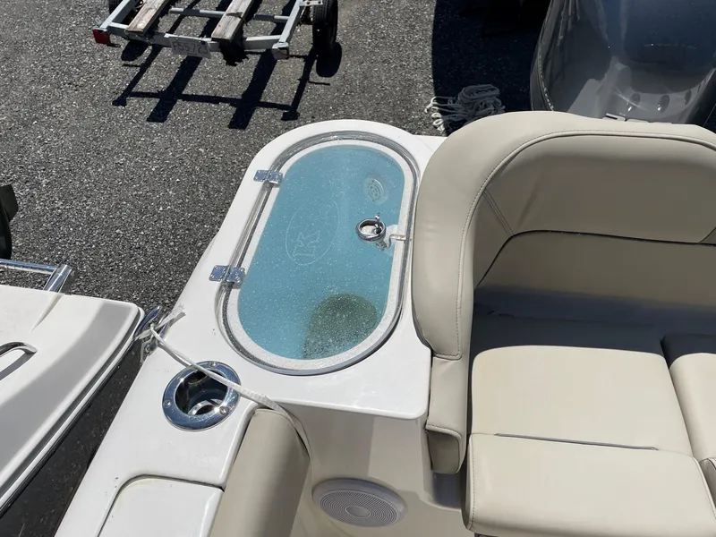 Slide: The Image of 2022 Key West 263 FS boat interior with seating and livewell. - 15