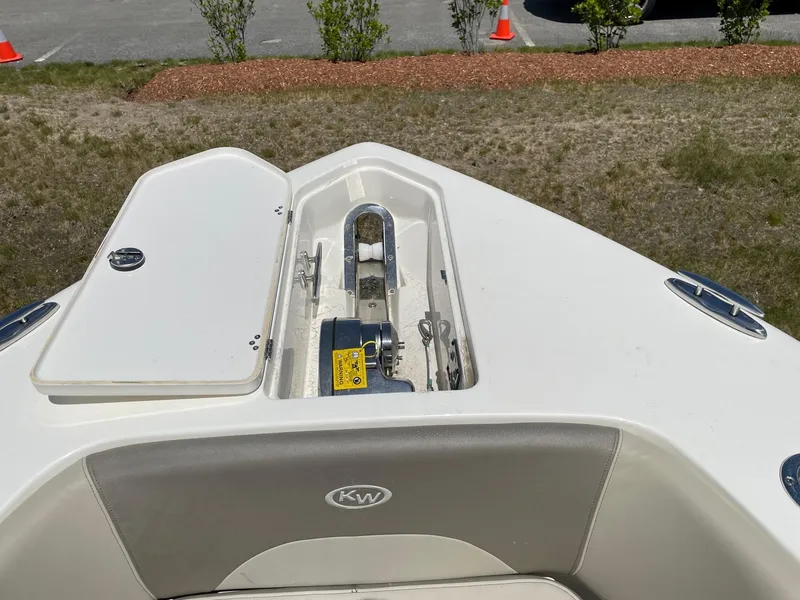 Slide: The Image of 2022 Key West 263 FS boat anchor compartment with open hatch. - 8