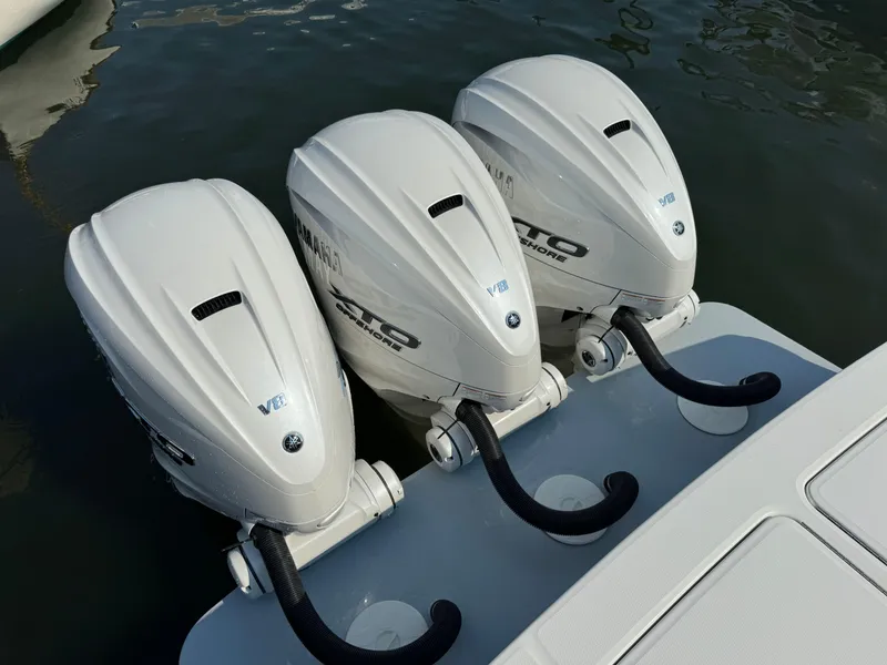 Slide: The Image of Triple Yamaha outboard engines on a 2025 Regulator 37 boat. - 15