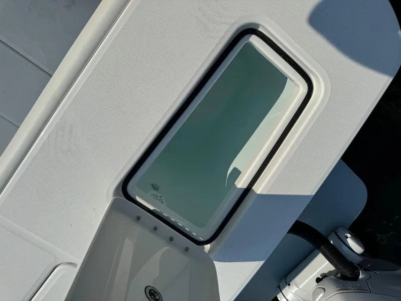 Slide: The Image of 2025 Regulator 37 boat deck with storage compartment. - 17