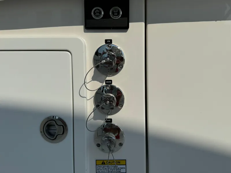 Slide: The Image of Fuel and water inlets on a 2025 Regulator 37 boat. - 22
