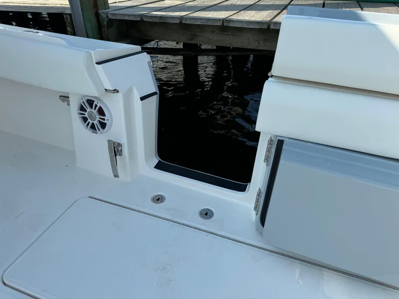 Slide: The Image of 2025 Regulator 37 boat deck with open transom door and speaker. - 28