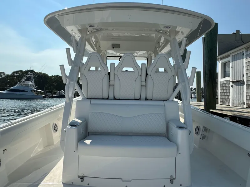 Slide: The Image of 2025 Regulator 37 boat with white seating and helm station. - 29