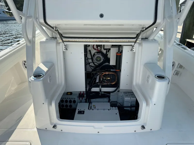 Slide: The Image of 2025 Regulator 37 boat engine compartment with open hatch. - 30