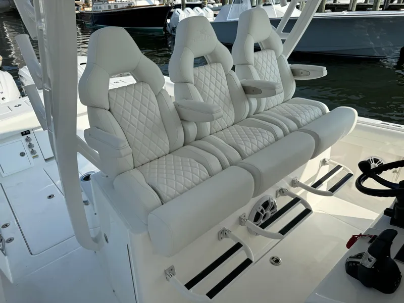 Slide: The Image of 2025 Regulator 37 boat with luxurious white leather seating. - 42
