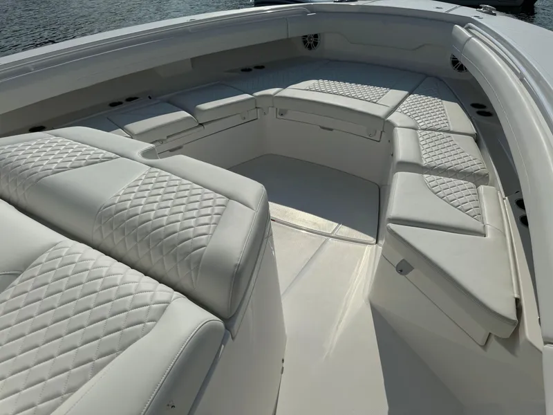Slide: The Image of Luxurious seating area on the 2025 Regulator 37 boat with quilted upholstery. - 46