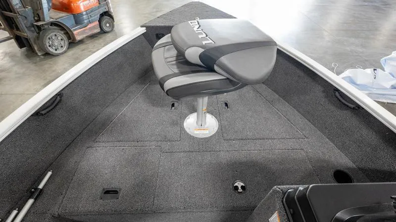 Slide: The Image of 2025 Lund 1650 Rebel XL SS boat interior with a swivel seat. - 10