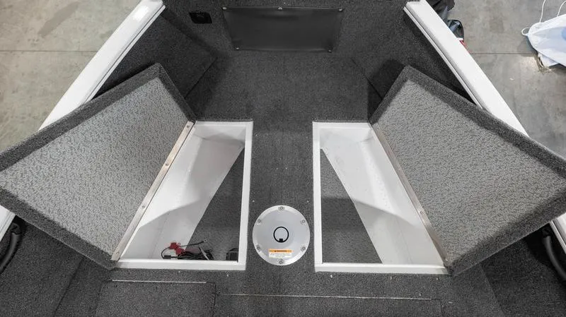 Slide: The Image of 2025 Lund 1650 Rebel XL SS boat storage compartments. - 19