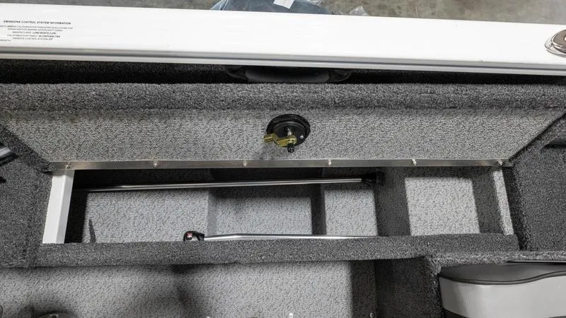 Slide: The Image of 2025 Lund 1650 Rebel XL SS boat interior storage compartment. - 21