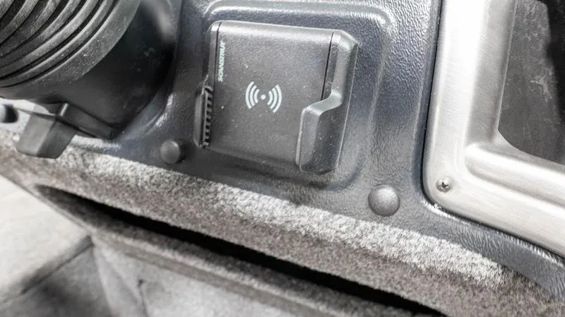 Slide: The Image of 2024 Lund 1875 Impact XS Sport dashboard with wireless charging pad. - 24