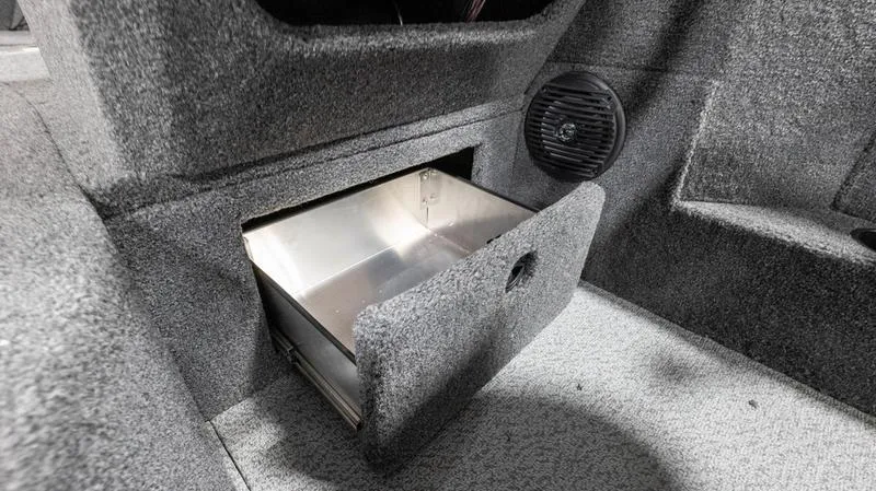 Slide: The Image of 2024 Lund 1875 Impact XS Sport boat storage compartment with open drawer. - 30