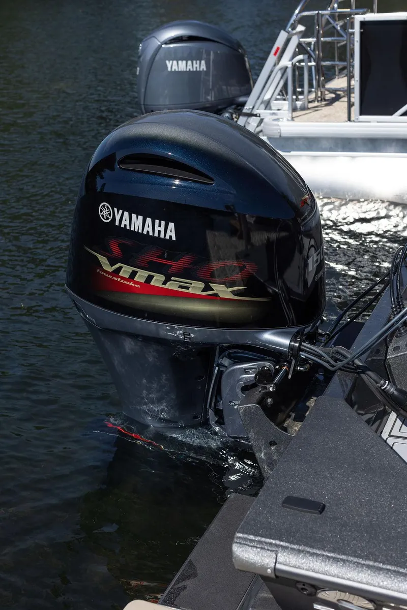 Slide: The Image of 2024 SeaArk FLEX21 with Yamaha VMAX outboard engine on water. - 10