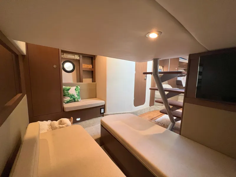 Slide: The Image of Interior of 2014 Sea Ray 350 Sundancer yacht with cozy seating and modern design. - 37