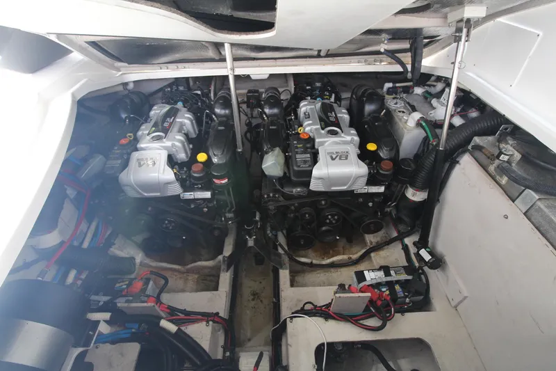 Slide: The Image of Engine compartment of a 2014 Sea Ray 350 Sundancer with dual V8 engines. - 40