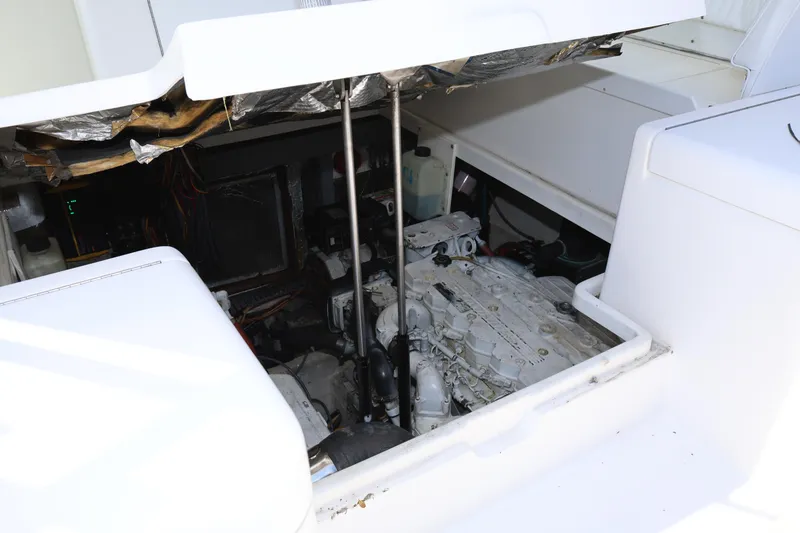 Slide: The Image of 2007 Luhrs 32 Open engine compartment with visible engine and components. - 11