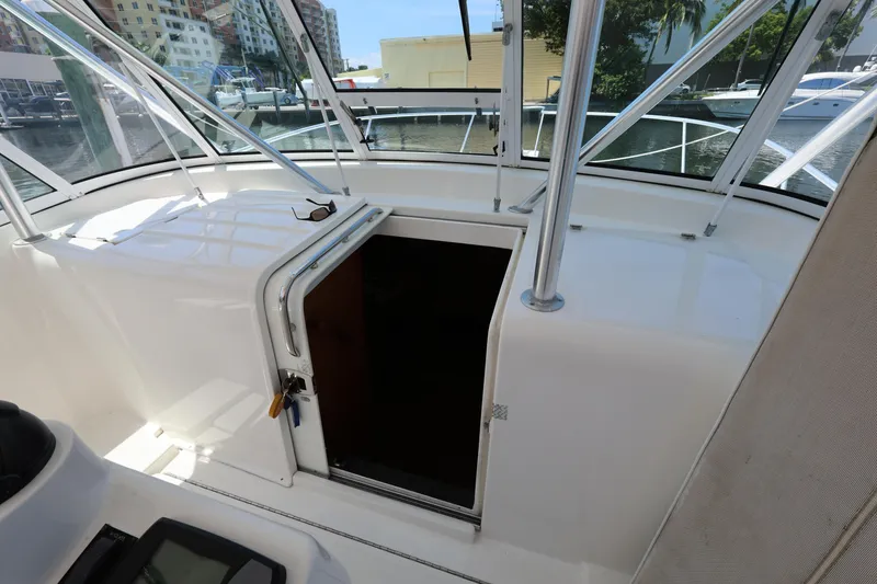 Slide: The Image of 2007 Luhrs 32 Open boat cabin entrance with marina view. - 18