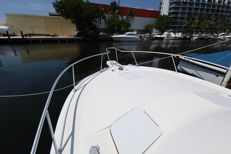Slide: The Image of 2007 Luhrs 32 Open boat bow view at marina. - 20