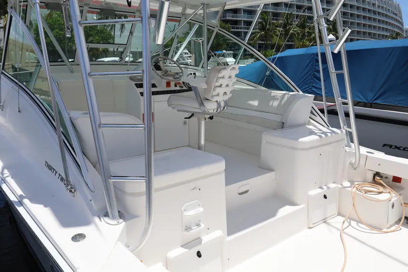 Slide: The Image of 2007 Luhrs 32 Open boat cockpit with seating and helm station. - 9