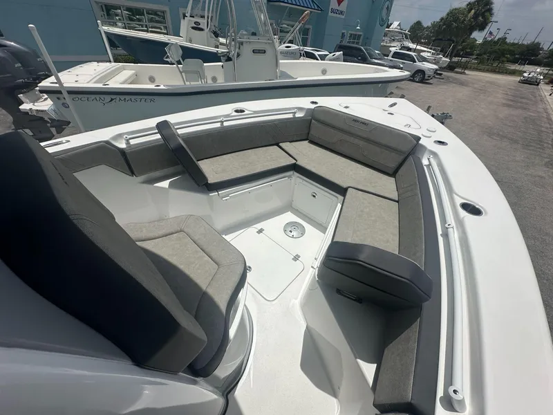 Slide: The Image of 2025 Sea Pro 245 FLX boat with spacious seating and modern design. - 5