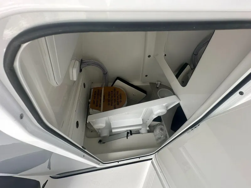 Slide: The Image of Interior storage compartment of 2025 Sea Pro 245 FLX boat. - 7