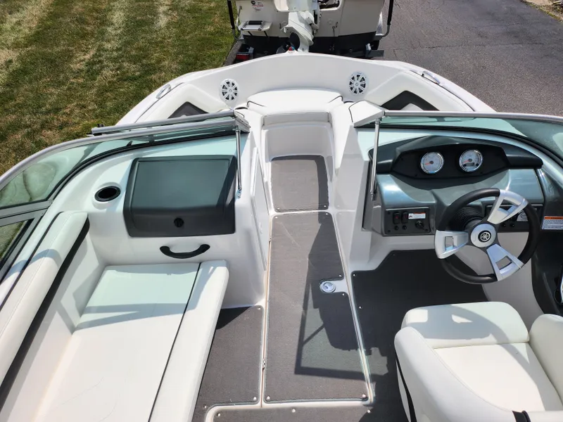 Slide: The Image of 2016 Yamaha Boats AR190 interior cockpit with steering wheel and seating. - 11