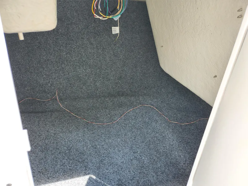 Slide: The Image of Interior storage compartment of a 2016 Yamaha Boats AR190. - 14