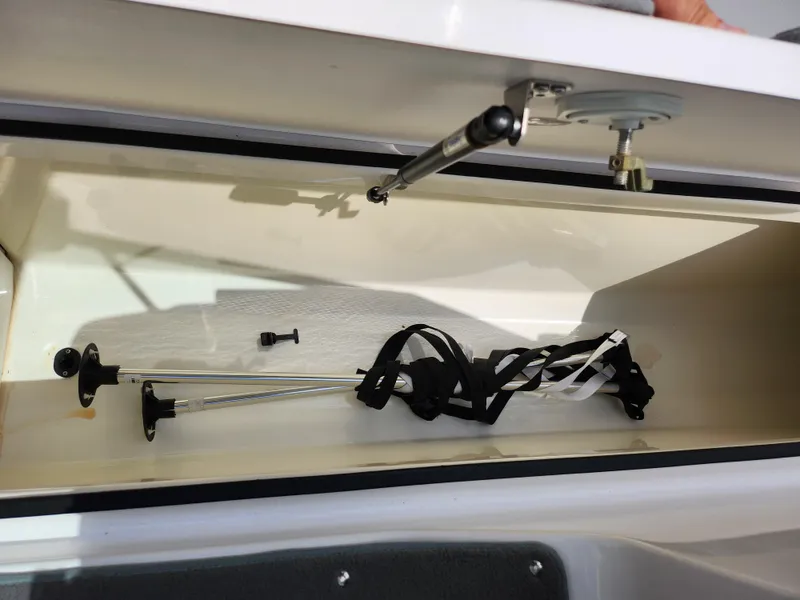 Slide: The Image of Storage compartment of a 2016 Yamaha Boats AR190 with accessories. - 15