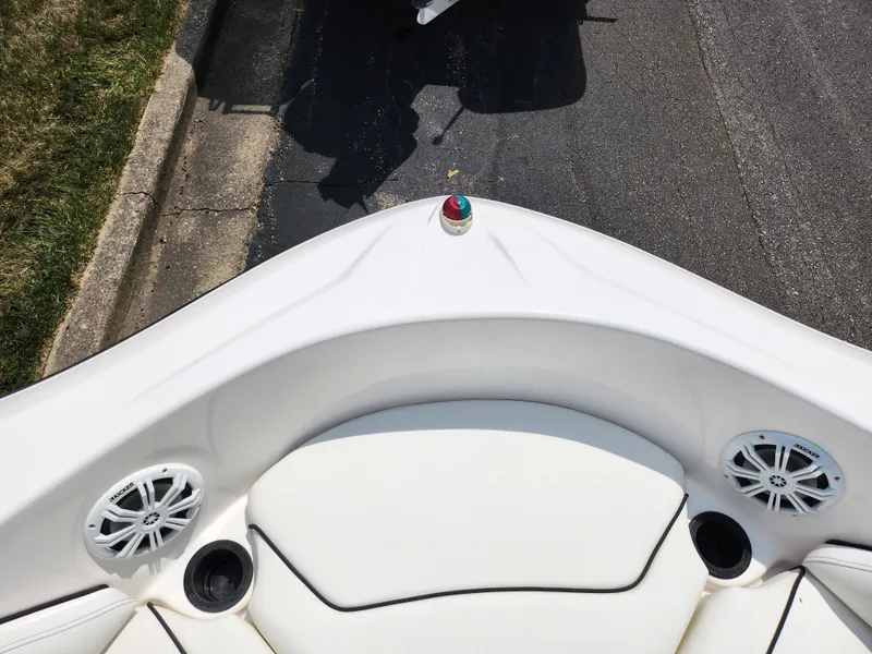 Slide: The Image of 2016 Yamaha Boats AR190 bow seating area with speakers and cup holders. - 17