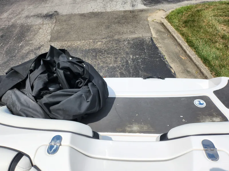 Slide: The Image of 2016 Yamaha Boats AR190 rear deck with black cover. - 23