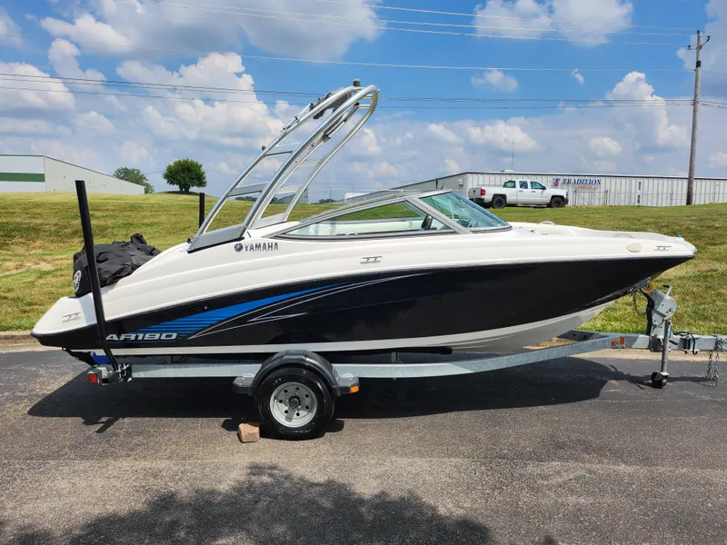 Slide: The Image of 2016 Yamaha Boats AR190 on trailer, black and white, side view. - 4
