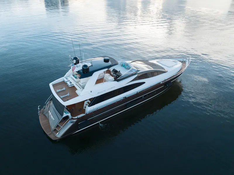Slide: The Image of Aerial view of a 2012 Riva 75 Venere luxury yacht on calm waters. - 10
