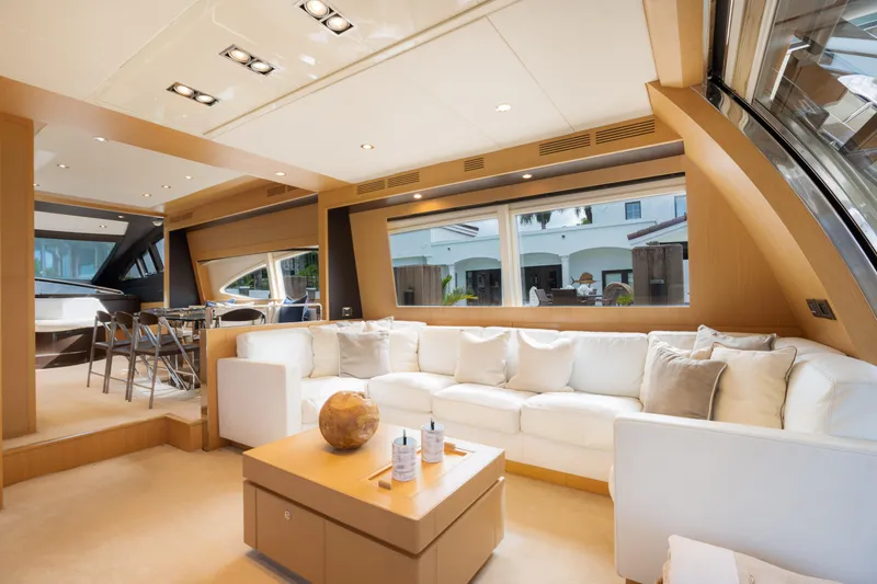 Slide: The Image of Luxurious interior of 2012 Riva 75 Venere yacht with white sofa and large windows. - 20